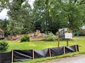 Residential lot mid-construction, featuring a sign that reads 
