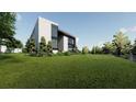 New construction featuring expansive grassy lawn and a modern architectural design at 2380 Greenglade Ne Rd, Atlanta, GA 30345