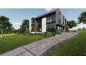 Modern home exterior featuring clean lines, large windows, and a beautifully landscaped front yard at 2380 Greenglade Ne Rd, Atlanta, GA 30345