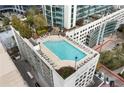 Rooftop pool area with lounge chairs offering a relaxing urban oasis at 3324 Peachtree Ne Rd # 1813, Atlanta, GA 30305