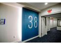 Hallway with unit number 38 and directional signage for multiple units at 270 17Th Nw St # 3804, Atlanta, GA 30363