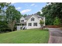 Charming two-story home with a well-manicured lawn and a classic American design at 125 Winter Valley Ct, Fayetteville, GA 30215