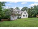 Charming home with a well-manicured lawn and a classic American design at 125 Winter Valley Ct, Fayetteville, GA 30215