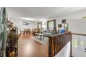 Inviting living area featuring an open floor plan and hardwood floors at 2501 Northbrook Rd, Snellville, GA 30039