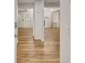 View from the doorway featuring new hardwood floors, fireplace and great natural lighting at 333 Lynne Cir, Alpharetta, GA 30009