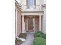 Inviting entryway with brick columns and landscaping at 3130 Haynes Park Dr, Lithonia, GA 30038