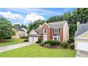 Beautiful two-story home with a two-car garage, brick accents, and landscaped front yard in a neighborhood setting at 3614 Clearbrooke Way, Duluth, GA 30097