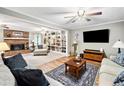Spacious living area with built-in bookshelves, fireplace, and neutral color palette at 6360 Lakeview Ter, Douglasville, GA 30135