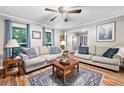 Cozy living room featuring hardwood floors, stylish furniture, and bright natural light at 6360 Lakeview Ter, Douglasville, GA 30135