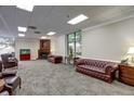 Comfortable lobby featuring stylish leather sofas, fireplace, and large windows with natural light at 300 Johnson Ferry Rd # A614, Atlanta, GA 30328