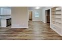 Spacious living room featuring open floor plan and direct access to the kitchen at 7054 Chappell Cir, Atlanta, GA 30360