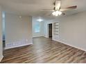 Open-concept living area with modern finishes, built-in shelving, and ample natural light at 7054 Chappell Cir, Atlanta, GA 30360