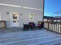 Cozy back deck with outdoor seating for relaxing and enjoying the weather at 2668 Memorial Se Dr, Atlanta, GA 30317