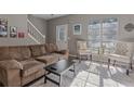 Cozy living room with neutral walls and contemporary furnishings at 3444 Washington Way, Atlanta, GA 30340