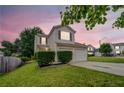 Charming two-story home with a two-car garage, landscaped yard, and inviting curb appeal at 3623 Thurleston Sw Ct, Marietta, GA 30008
