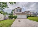 Charming two-story home with a two-car garage, landscaped yard, and inviting curb appeal at 3623 Thurleston Sw Ct, Marietta, GA 30008