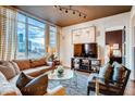Inviting living room with modern decor, large windows, and sophisticated lighting at 1820 Peachtree Nw St # 811, Atlanta, GA 30309