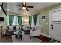 Cozy living room with hardwood floors, stylish decor, and ample natural light at 3116 Jackson St, Hapeville, GA 30354