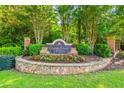 Stone sign that reads 'Garner Creek at Parkview' with manicured landscaping surrounding it at 5121 Hope Sw Ct, Lilburn, GA 30047