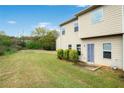 Expansive backyard with lush green grass and minimal landscaping at 2528 Morgan Chase Dr, Buford, GA 30519
