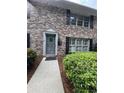 Inviting brick exterior with a well-maintained lawn and trimmed bushes at 2435 Northlake Ct, Atlanta, GA 30345
