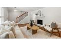 Bright living room with a fireplace, hardwood floors and lots of natural light at 2435 Northlake Ct, Atlanta, GA 30345