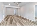 Bright, spacious living room with wood-look floors and recessed lighting at 3175 Dogwood Dr, Atlanta, GA 30354