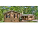 Charming single story home features a quaint front porch and well-maintained landscaping at 364 Stafford Sw St, Marietta, GA 30064