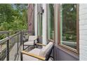 Relaxing balcony space with comfortable seating, perfect for enjoying outdoor views and fresh air at 1251 Chelsea Nw Cir # 30, Atlanta, GA 30318
