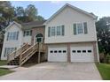 Traditional two-story home with brick accents, a two-car garage, and inviting entryway at 2775 Emerald Springs Dr, Lawrenceville, GA 30045