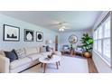 Bright living room featuring modern decor, hardwood floors, and ample natural light at 256 Indian Trl, Marietta, GA 30068