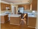 Eat in kitchen featuring stainless steel appliances and central island at 3718 Jackson Bluff Dr, Lawrenceville, GA 30044