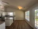 Charming eat-in kitchen with granite countertops, stainless steel appliances, and natural light at 3718 Jackson Bluff Dr, Lawrenceville, GA 30044