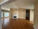 Spacious living room with hardwood floors and marble fireplace at 3718 Jackson Bluff Dr, Lawrenceville, GA 30044