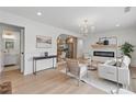 Spacious open-concept living area featuring a dining space and fireplace at 2244 Alpha Dr, Decatur, GA 30032
