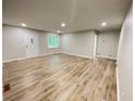 Spacious living room with new floors, fresh neutral paint, and plenty of natural light at 336 Shady Lane Cir, Canton, GA 30115