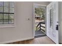 Inviting entryway featuring a decorative door and a view of the front porch at 6991 Flagstone Dr, Austell, GA 30168