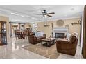 Spacious living room with tile floors and comfortable seating at 212 Lakeview Dr, Newborn, GA 30056