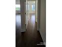 Hallway features hardwood floors and white doors at 2479 Peachtree Ne Rd # 902, Atlanta, GA 30305