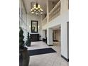Grand entrance featuring a chandelier, tiled floors, a mirror and plenty of natural light at 2479 Peachtree Ne Rd # 902, Atlanta, GA 30305