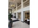 Grand entrance featuring a chandelier, tiled floors, a mirror and plenty of natural light at 2479 Peachtree Ne Rd # 902, Atlanta, GA 30305