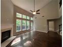Spacious living room with fireplace, soaring ceilings and abundant natural light at 944 Reap Ln, Lawrenceville, GA 30043