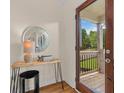 Warm entryway with a stylish console table and a view of the welcoming front porch at 35 Lady Morgan Ln, Dallas, GA 30157