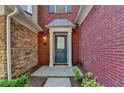 Charming front entryway with stone and brick accents at 2008 Hailston Dr, Duluth, GA 30097