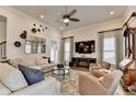 Bright living room with a fireplace, and contemporary decor at 1002 Harvest Park Ln, Suwanee, GA 30024