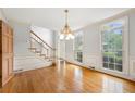Spacious dining area features hardwood floors, and elegant windows, providing ample natural light at 3741 Bays Ferry Way, Marietta, GA 30062