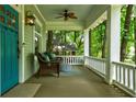 Inviting porch with seating area and view of the surrounding greenery at 630 Cleburne Ne Ter, Atlanta, GA 30306