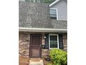 Charming brick townhouse featuring a well-maintained front entrance at 3117 Reeves Se St, Smyrna, GA 30080