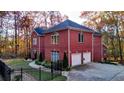 Beautiful two-story brick home featuring a two-car garage and manicured landscaping at 271 Brooks Rackley Rd, Dallas, GA 30157