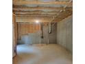 Unfinished basement with exposed beams and concrete walls and plumbing at 558 Fairview Oak Pl, Dallas, GA 30157